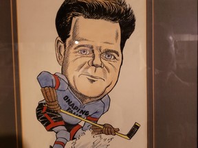 A caricature of Bob Parker, wearing the uniform of his beloved Onaping Falls Huskies.