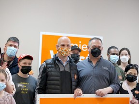 Jamie West, NDP incumbent for Sudbury in the June 2 provincial election, poses for photos with supporters, family and friends during an event to open his campaign office on Notre Dame Avenue in Sudbury, Ontario on Saturday, May 7, 2022.