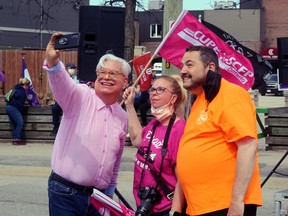 Fred Hahn, president of CUPE Ontario, takes a selfie with Amanda and Henri Giroux, Tuesday, at a rally outside the Northern Ontario Leaders Debate.
PJ Wilson/The Nugget