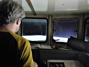 It's about 6 a.m. in the wheelhouse of Lady Anna II. Captain Mike Mummery stares over 25 feet of bow, glowing white under the masthead LED light while steering due south into the curtain of darkness hanging over Lake Erie and the first "set" of the day. John Martinello photo