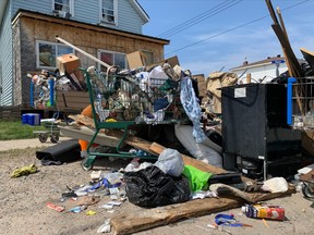 The neighbours near an 800-block McIntyre Street E. residence are fed up with the garbage, drug paraphernalia and food that has been dumped in the front yard. The City of North Bay's bylaw office says it is aware of the situation and it should be cleaned up on Friday.