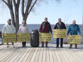 The Pembroke Community Garden group is currently holding a rainbarrel.ca fundraising campaign in support of the community gardens in the city. In the photo from left, volunteers and food bank garden co-ordinators Mary Mercer and Ruth Molnar, Coun. Brian Abdallah, St. Joseph's Food Bank president Rene Lachapelle, and Deputy Mayor Ron Gervais. Abdallah and Gervais are co-chairmen of the community garden. Anthony Dixon