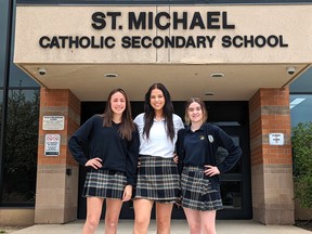 Three St. Michael Catholic secondary students were recently recognized as being at the tops of their fields after each winning a medal at recent Skills Ontario competitions, Pictured from left, Meghan Keene, Grade 12, won a bronze medal in hairstyling, Paige Knechtel, Grade 12, won a silver medal in aesthetics, and Anne Doig, Grade 9, won a gold medal in aesthetics. Galen Simmons/The Beacon Herald/Postmedia Network