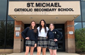 Three St. Michael Catholic secondary students were recently recognized as being at the tops of their fields after each winning a medal at recent Skills Ontario competitions, Pictured from left, Meghan Keene, Grade 12, won a bronze medal in hairstyling, Paige Knechtel, Grade 12, won a silver medal in aesthetics, and Anne Doig, Grade 9, won a gold medal in aesthetics. Galen Simmons/The Beacon Herald/Postmedia Network