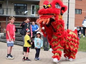 Quickly Bubble Tea, located in the Centre in the Park, celebrated its grand opening on Saturday, May 7 with a traditional Chinese lion dance and drum show. Lindsay Morey/News Staff