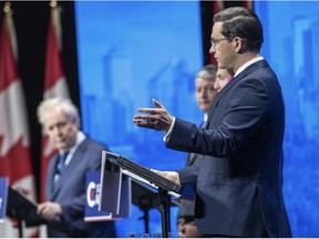 Conservative leadership candidates Leslyn Lewis, Roman Baber, Jean Charest, Scott Aitchison, Patrick Brown and Pierre Poilievre, take part in the Conservative Party of Canada English leadership debate on Wednesday, May 11 in Edmonton. Greg Southam/Postmedia