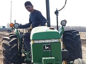 Matthew Sterling of Pain Court competes in the Canadian Plowing Championship in Rivers, Man. He won the championship in the junior conventional class. (Handout/Postmedia Network)