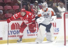 Soo Greyhounds forward Rory Kerins and Flint Firebirds goaltender Luke Cavallin in first period action during Game 4 of the Western Conference semifinal at GFL Memorial Gardens on Thursday night. Brennan Othmann scored in overtime as the Firebirds picked up a 3-2 win. Game 5 is set for 7 p.m. on Saturday night in Flint.