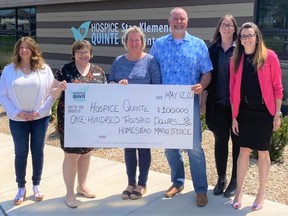 Mike and Nickey Eden (centre), owners of Homestead Marketplace, along with their CFO Audrey Lessard and marketing director Katie Fitzsimmons (on the right), presented Thursday a $100,000 cheque to Hospice Quinte executive director Jennifer May-Anderson and donor relations and communications manager Sandi Ramsay (on the left) outside the Hospice Quinte Stan Klemencic Care Centre.