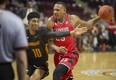 Windsor’s Billy White drives past Sudbury’s Tyrell Gumbs-Frater during a National Basketball League of Canada game between the Windsor Express and the Sudbury Five at WFCU Centre in Windsor, Ontario, on Friday, May 13, 2022. Visit www.thesudburystar.com for a story from Friday's game.