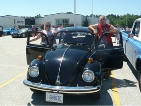 No word who will be behind the wheel this summer, but in July 2020, Saugeen Shores’ Robin Woods (left), allowed husband Dave Middleton, organizer of the first 'Cruising Grey Bruce' rally, to drive her 1973 Beetle in the rolling car show that drew approximately 600 vehicles to the starting point at The Plex in Port Elgin. PHOTO BY FRANCES LEARMENT