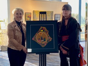 Fort Saskatchewan Mayor Gale Katchur poses with local Metis artist Angela Hebert. Hebert's piece, Angels Among Us, was chosen as the winner of the 2022 Art in Public Places contest. The piece was created in response to the discovery of 215 unmarked graves at a Kamloops Residential School in 2021. Photo Supplied.