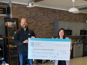 Title sponsor NPX presents a cheque $5,500; pictured are Gregg Stewart (CFO of NPX), Yolanda Ritsema (BBBSKD Executive Director) and Spot the Robot. SUBMITTED