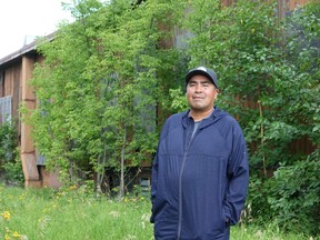Chief Chris Skead of Wauzhushk Onigum Nation standing by some of the grounds that were investigated.