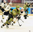 Mitchell Russell rushes the puck in the clinching game last Saturday night of the North Bay Battalion's Ontario Hockey League series win over the visiting Kingston Frontenacs. The Troops open the Eastern Conference final Friday night at the Hamilton Bulldogs.
Sean Ryan Photo