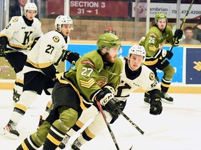 Mitchell Russell rushes the puck in the clinching game last Saturday night of the North Bay Battalion's Ontario Hockey League series win over the visiting Kingston Frontenacs. The Troops open the Eastern Conference final Friday night at the Hamilton Bulldogs.
Sean Ryan Photo