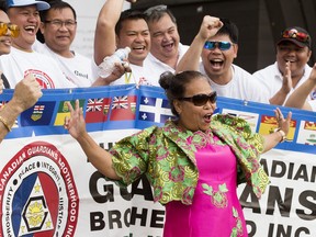Members of the Philippine Canadian Guardians Brotherhood Inc. (PCGBI) Fort McMurray Chapter dance during the 2018 Edmonton Filipino Fiesta on Saturday June 23, 2018. Photo by David Bloom