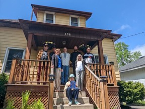 Members of the Manuel family, the Till family and the Kalmusky family joined Jamie Hewitt and Olver VonWitzenhausen. the current occupants at 138 Well St. in Stratford, to officially recognize the house as the childhood home of famed rock composer, keyboardist and singer Richard Manuel with the presentation of a Blue Plaque from Heritage Stratford and the City of Stratford Thursday afternoon. (Galen Simmons/The Beacon Herald)