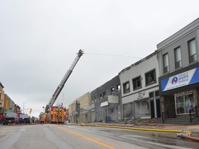 Firefighters battle a blaze that damaged and destroyed a secton of Hanover's downtown on Thursday, May 19, 2022.