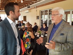 Ontario Party Leader Derek Sloan, left, is shown with Chatham-Kent-Leamington candidate Rick Nicholls on Friday at the Links of Kent Golf Club and Event Centre in Chatham. (Trevor Terfloth/The Daily News)
