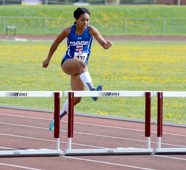 Keenyah Murray, of Timmins High & Vocational School, clears the final hurdle before racing to the finish line during the Junior Female 300-Metre Hurdles at the 2022 NEOAA Track & Field Championships at Timmins Regional Athletics and Soccer Complex on Wednesday. In addition to winning the event, Murray also finished first in the 100 metres and 200 metres and was part of the TH&VS team that won the Senior Female 4x100-Metre Relay, giving her four gold medals on the day. THOMAS PERRY/THE DAILY PRESS