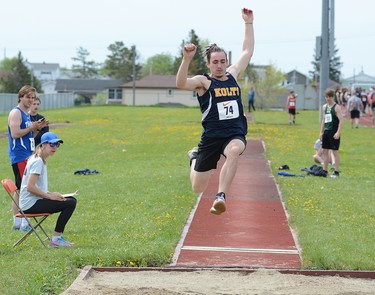 Levi Coombs, of Kapuskasing District High School, leaps to a second-place finish in the Senior Male Long Jump event at the 2022 NEOAA Track & Field Championships at Timmins Regional Athletics and Soccer Complex on Wednesday. Coombs finished second in the event to Jacy Godbout, of École secondaire catholique Hearst. THOMAS PERRY/THE DAILY PRESS