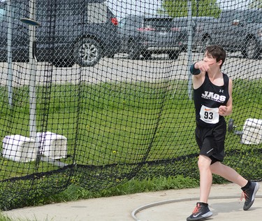 Maxime Girard, of École secondaire publique Renaissance, unleashes a throw during the Novice Male Discus event at the 2022 NEOAA Track & Field Championships at Timmins Regional Athletics and Soccer Complex on Wednesday. Girard finished second in the event, behind Timmins High and Vocational School’s Gage McKenzie. THOMAS PERRY/THE DAILY PRESS