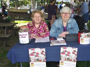 As the Powassan and District Food Bank gets ready to launch its new website, food bank members will be regular fixtures at this year's farmers' market. Long-time food bank volunteer Betty Leblanc, left, and food bank coordinator Diane Cole man the booth Saturday.
Rocco Frangione Photo