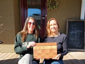 The 2022 Marilyn Alexander Tourism Champion Award winner was Cindy Jamieson (right), owner of the Whitewater Inn and Valley Cycle Tours. Presenting is awards co-chairwoman Meghan James of the Somewhere Inn Calabogie.