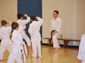 Sensei Mike Bujold of Spruce Grove Wado-Kai Karate leads his students in a lesson at École Broxton Park School earlier this year. Photo supplied by Spruce Grove Wado-Kai Karate.