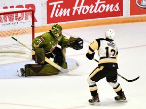 Avery Hayes of the visiting Hamilton Bulldogs scores on a second-period penalty shot against goaltender Dom DiVincentiis of the North Bay Battalion in their Ontario Hockey League playoff game Friday night. Hamilton swept the Eastern Conference final in four games.
Sean Ryan Photo