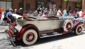 This 1930 Packard Dual Cowl Phaeton was attracting a lot of attention while on display in downtown Chatham Saturday during RetroFest.  PHOTO Ellwood Shreve/Chatham Daily News