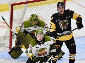 Ty Nelson and goaltender Dom DiVincentiis of the North Bay Battalion stand guard against Ryan Winterton and the Hamilton Bulldogs at FirstOntario Centre in Game 2 of their Ontario Hockey League playoff series. Hamilton swept the best-of-seven Eastern Conference final.
Sean Ryan Photo