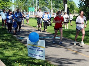 Walkers and runners set out at the start of the Defeat Depression walk in North Bay, Saturday.
PJ Wilson/The Nugget