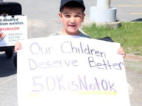 Parents of children with autism took part in a protest against the Progressive Conservatives and their handling of the Ontario Autism Program in Sudbury, Ontario on Saturday, May 28, 2022. Ben Leeson/The Sudbury Star/Postmedia Network