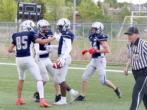 Sudbury Junior Spartans cenebrate a touchdown by Zidaine Allen during Ontario Summer Football League action against the Peel Pamthers at James Jerome Sports Complex in Sudbury, Ontario on Saturday, May 28, 2022.