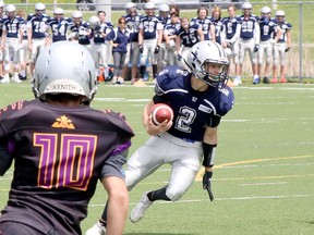 Sudbury Junior Spartans quarterback Steven Sola (2) carries the ball during Ontario Summer Football League action against the Peel Panthers at James Jerome Sports Complex in Sudbury, Ontario on Saturday, May 28, 2022.