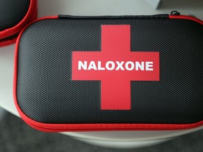 Free kits containing naloxone, a temporary antidote for opioid toxicity, sit in the entranceway of Hastings Prince Edward Public Health. At least some of the region's rates of opioid-related harm exceed the Ontario averages.