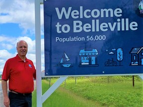 Mayor Mitch Panciuk stands beside a new city sign installed on Highway 2 indicating the increase in population of Belleville to 56,000 people as reported by the Statistics Canada Census 2021. CITY OF BELLEVILLE