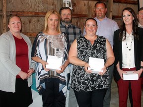 On behalf of Wetaskiwin Regional Schools Division Trustee Kathryn Weremy (left) and Dep. Superintendent Rick Hayes (right) honoured the staff members who responded to an emergency situation at Pigeon Lake Regional School when one student stabbed another one April 25.
Christina Max