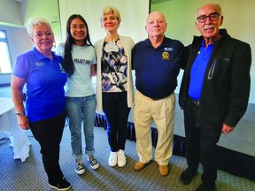 The Nisku-Leduc Rotary Club held a special breakfast meeting at Red Tail Landing, May 26, to learn about Project Amigo, and to celebrate the club's sponsored student, Alondra De Jesus Ascencio. From left: Elly Contreras, Alondra DeJesus Ascencio, Lina Wilson, Gord Lewis, and Romero Contreras. (Dillon Giancola)