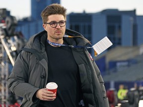 General Manager Kyle Dubas of the Toronto Maple Leafs heads to a breazy practice prior a game against the Buffalo Sabres during the 2022 Tim Hortons NHL Heritage Classic at Tim Hortons Field on March 12, 2022 in Hamilton, Ontario, Canada. (Photo by Claus Andersen/Getty Images)