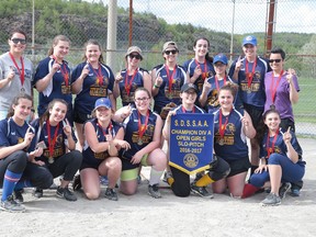 Members of the College Notre Dame Alouettes celebrate after winning the high school girls slo-pitch division A championship in Sudbury, Ont. on Monday May 29, 2017.