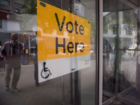 An Elections Ontario sign is seen at University - Rosedale voting location at the Toronto Reference Library on Thursday, June 7, 2018. Advance voting locations open today across Ontario as party leaders fan out across the province to pitch voters on their platforms.THE CANADIAN PRESS/Marta Iwanek