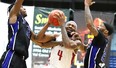 Jabari Craig and Joel Kindred of the Kitchener Waterloo Titans block a shot from  Dexter Williams Jr. of the Sudbury Five during National Basketball League of Canada semifinal action at Sudbury Community Arena on Sunday afternoon. The Titans defeated the Five 122-116.