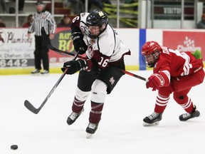 Chatham Maroons' Cameron Symons, left, is chased by Leamington Flyers' Ryan Clark at Chatham Memorial Arena in Chatham, Ont., on Sunday, May 8, 2022. Mark Malone/Chatham Daily News/Postmedia Network