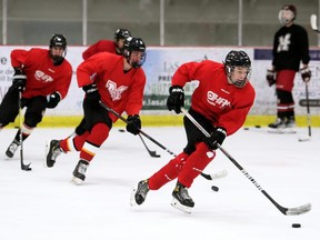 The Chatham Maroons run a drill during practice at Chatham Memorial Arena in Chatham, Ont., on Wednesday, May 25, 2022. Mark Malone/Chatham Daily News/Postmedia Network