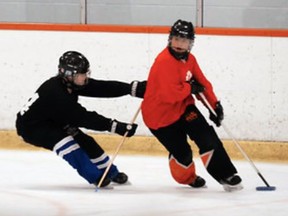 Erika Neubrand (right) is captured during the national junior ringette selection camp in Mississauga May 20-23. SUBMITTED