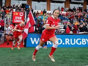 Canada captain Breanne Nicholas of Blenheim, Ont., leads the rugby sevens team into a game against Spain on Day 1 of the HSBC Canada Women's Sevens at Starlight Stadium on April 30, 2022, in Langford, Canada. (Mike Lee-KLC fotos for World Rugby)