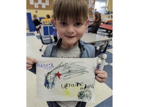 Levi Brebric, a senior kindergarten student at Tilbury Area Pubic School, organized a coin collection at his school to support Ukraine. He and his fellow stuents came up with $700 that will be donated to UNICEF Canada. (Handout/Postmedia Network)